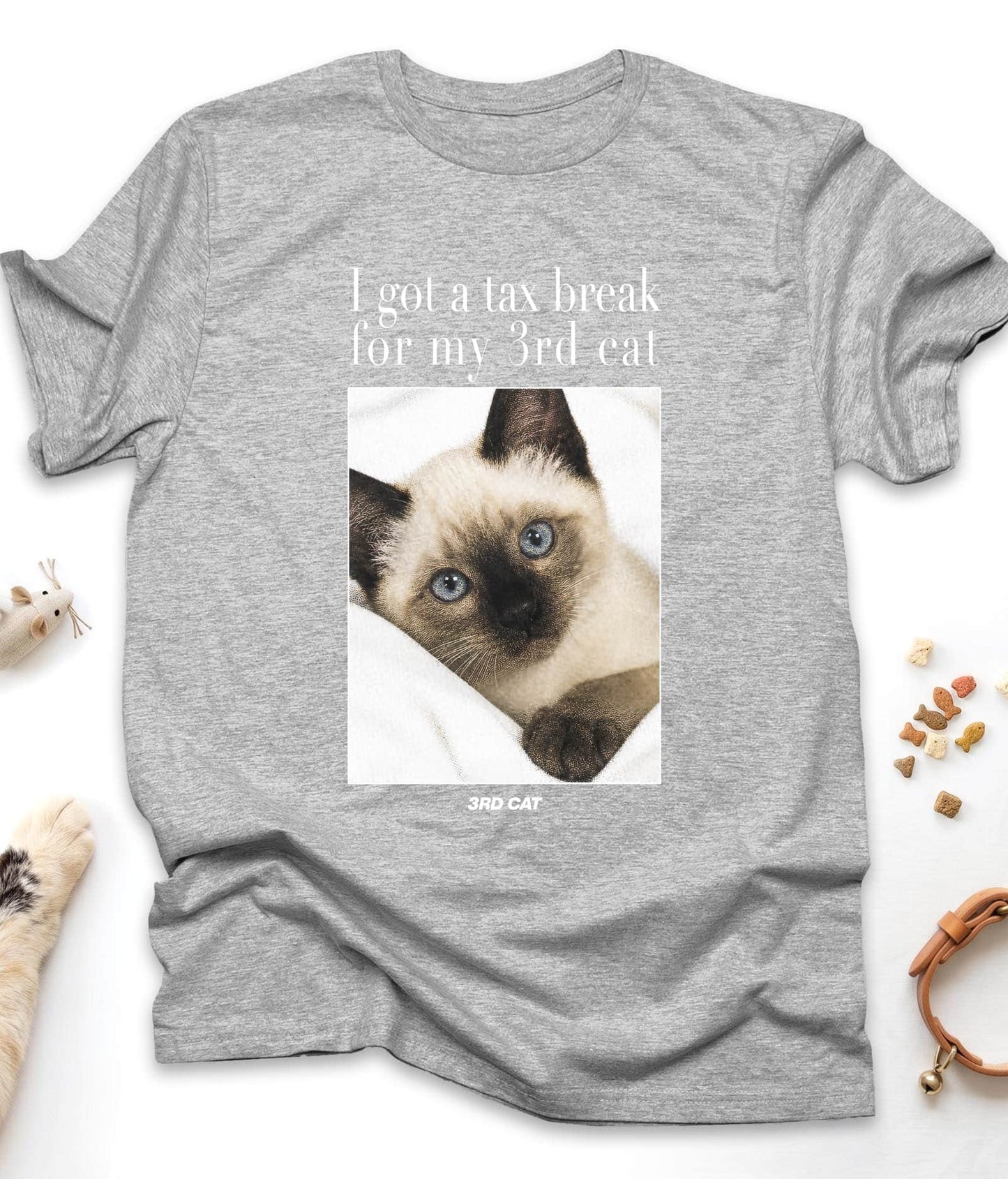 Sport Grey funny cat t-shirt with "I Got A Tax Break For My 3rd Cat (Siamese)" design, flat lay top view