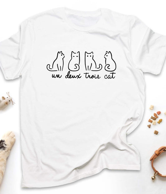 White funny cat t-shirt with "Un Deux Trois Cat" design, front view