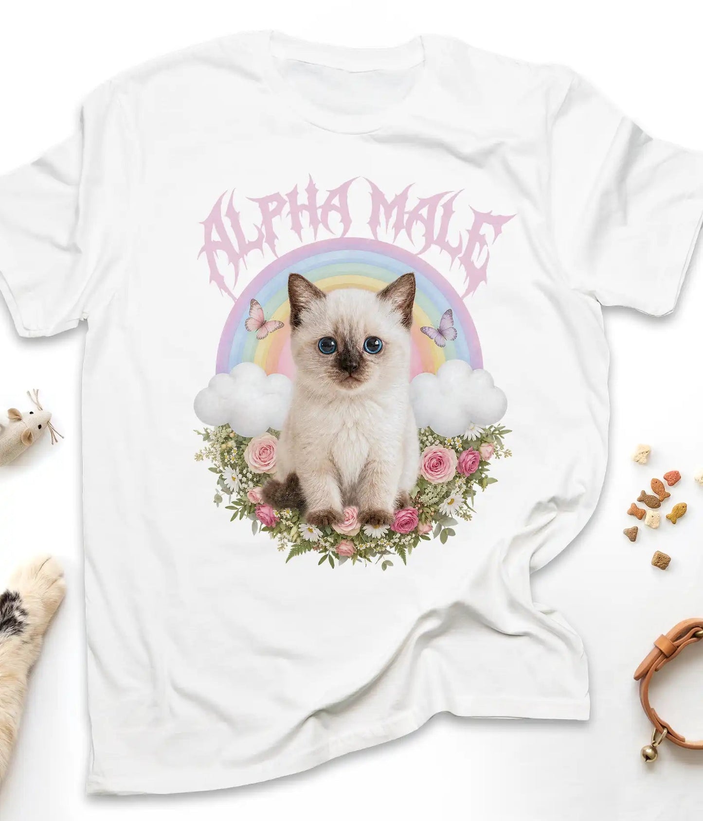 White funny cat t-shirt with an Alpha Male kitten and rainbow design, flat lay top view