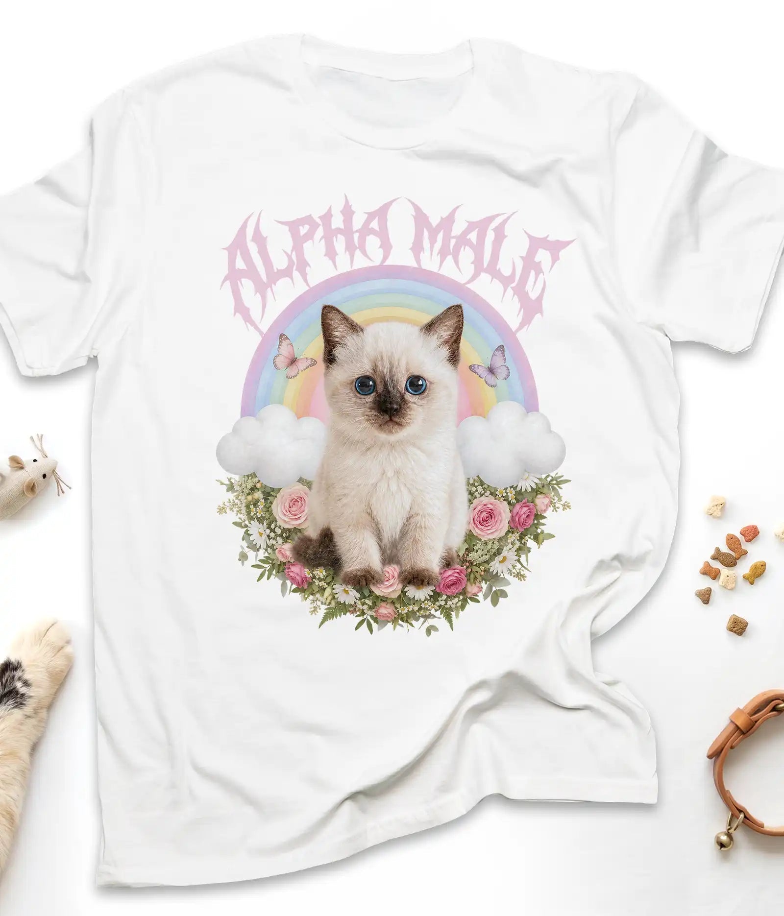 White funny cat t-shirt with an Alpha Male kitten and rainbow design, flat lay top view