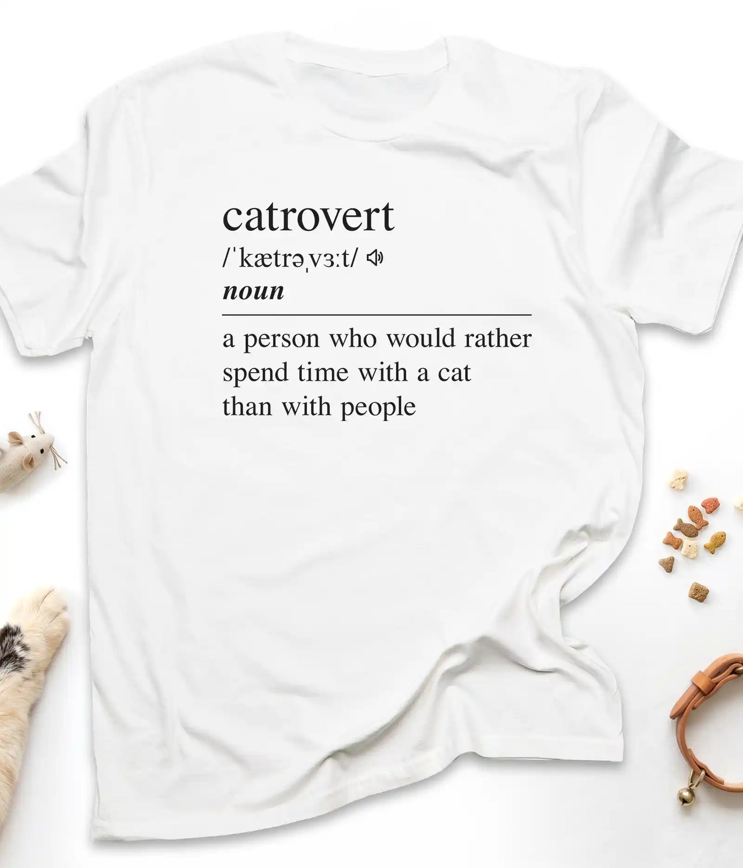 White funny cat t-shirt with "Catrovert" dictionary definition design, flat lay top view
