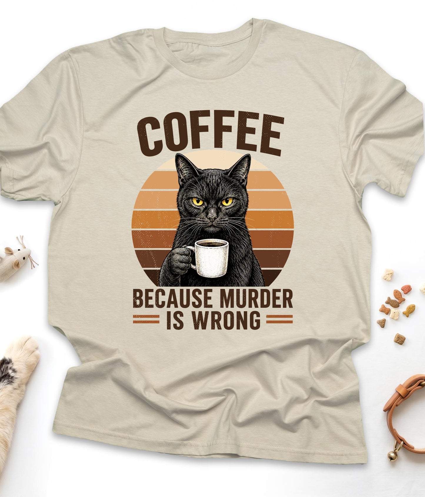 Sand funny cat t-shirt with "Coffee Because Murder Is Wrong" design, front view