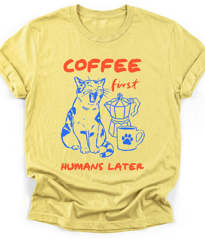 Cornsilk funny cat t-shirt with "Coffee First Humans Later" design, front view