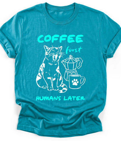 Tropical Blue funny cat t-shirt with "Coffee First Humans Later" design, front view