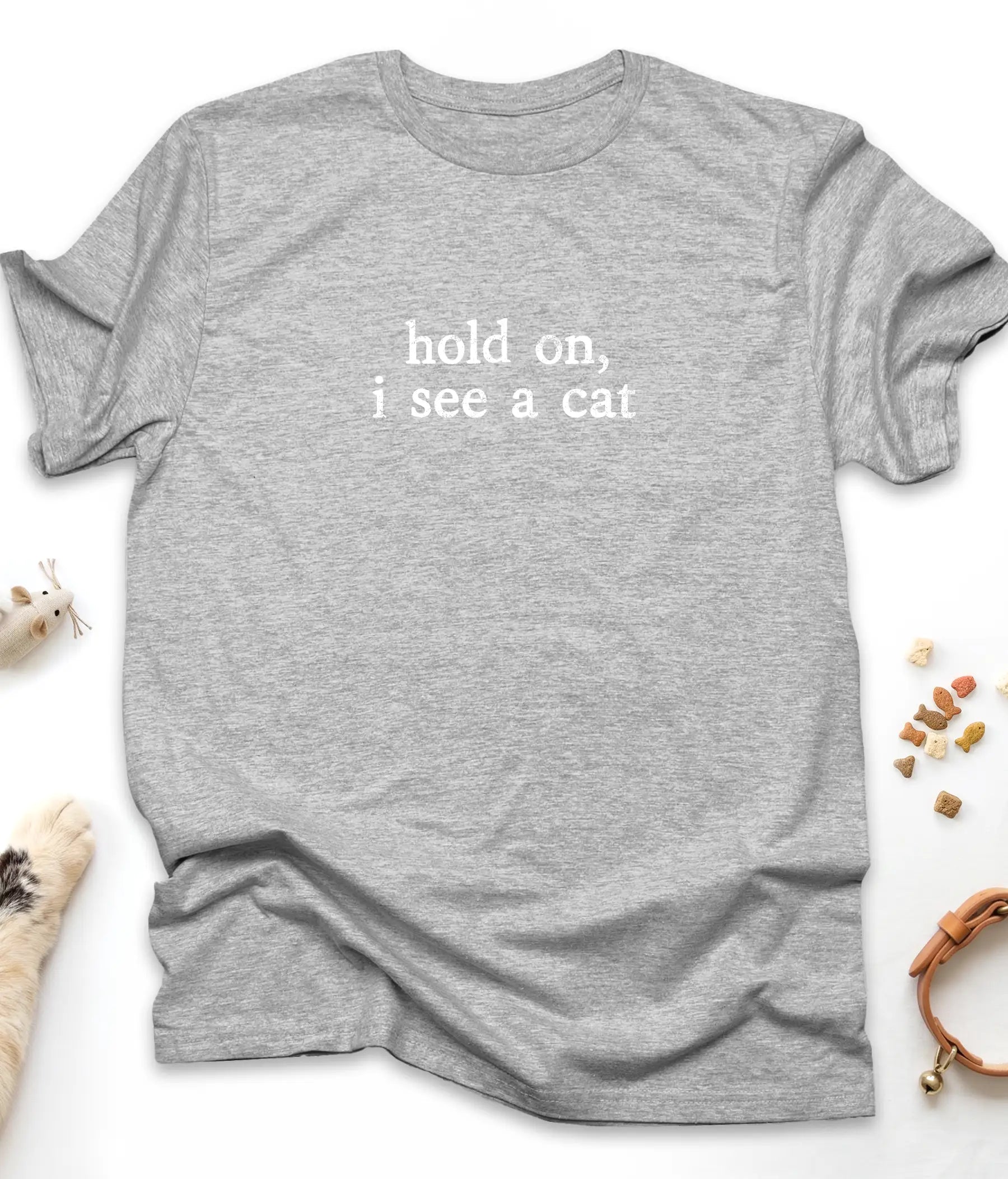 Sport Grey funny cat t-shirt with "Hold On, I See A Cat" design, flat lay top view