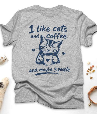 Sport Grey funny cat t-shirt with "I Like Cats And Coffee And Maybe 3 People" design, flat lay top view