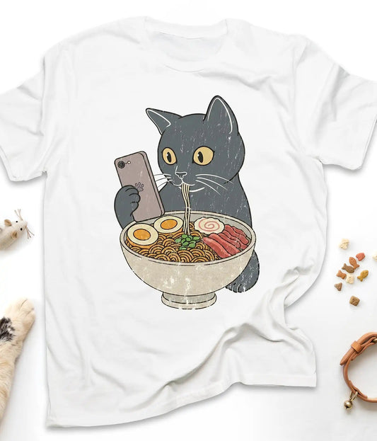 White funny cat t-shirt with a cat slurping ramen noodles, flat lay top view