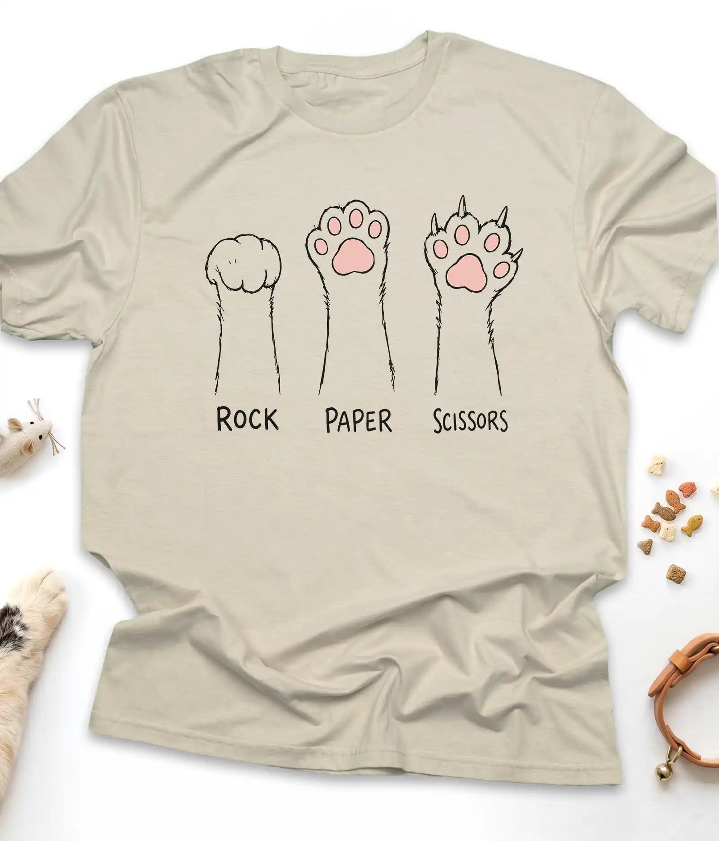 Sand funny cat t-shirt with cat paws "Rock Paper Scissors" design, flat lay top view