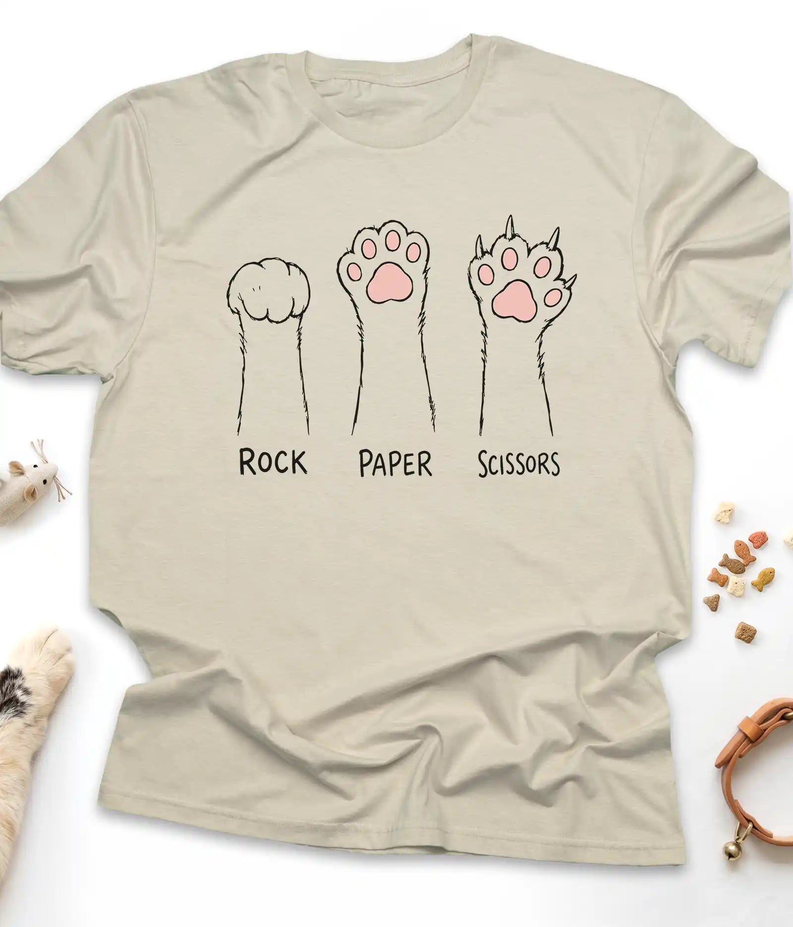 Sand funny cat t-shirt with cat paws "Rock Paper Scissors" design, flat lay top view