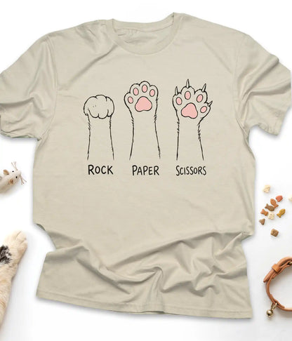 Sand funny cat t-shirt with cat paws "Rock Paper Scissors" design, flat lay top view