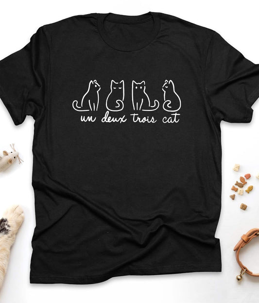 Black funny cat t-shirt with "Un Deux Trois Cat" design, front view