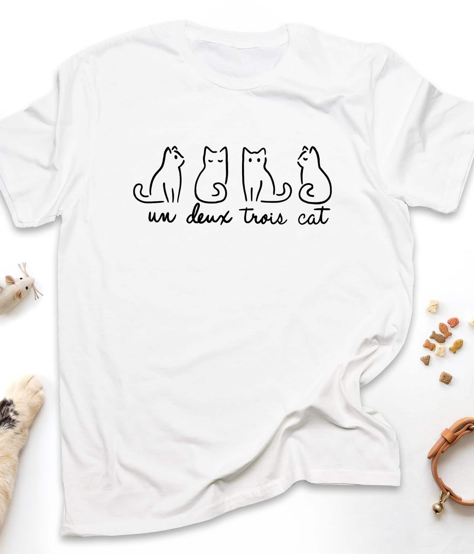 White funny cat t-shirt with "Un Deux Trois Cat" design, front view